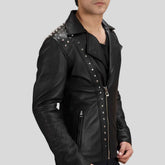 Black leather jacket with studded details on a white background