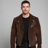 Man wearing brown suede motorcycle jacket with black jeans