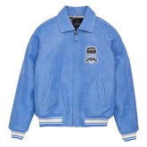 A light blue suede-like zip-up jacket with a pointed collar, front pockets, and ribbed cuffs and hem. A small chest patch reads 'AVIFRE' with a striped flag graphic.
