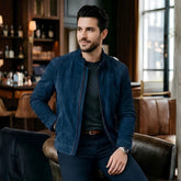 Man wearing navy blue suede jacket with sweater