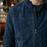 Close-up of snap collar on blue suede jacket