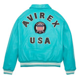 Turquoise leather jacket shown from the back, featuring 'AVIREX USA' in black varsity lettering with a circular American flag crest in the center and striped ribbed cuffs and hem.