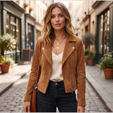 Woman wearing tan suede biker jacket with jeans