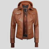 A brown faux-leather hooded jacket with a front zipper, chest flap pockets, and ribbed cuffs, shown on a solid gray background.