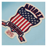 Embroidered patch featuring a patriotic American flag design with the text 'ANIREY' at the top, 'ESTABLISHED' on a banner, and '1975' at the bottom, shown on a light blue textured background.