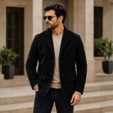 Man wearing black suede blazer with dress shirt