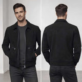 A man modeling a black suede-like zip-front jacket, shown from both the front and back against a clean light gray studio background.