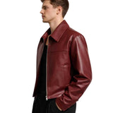 Side profile of men's burgundy leather jacket showing fit