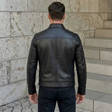 Back view of men's black leather cafe racer jacket