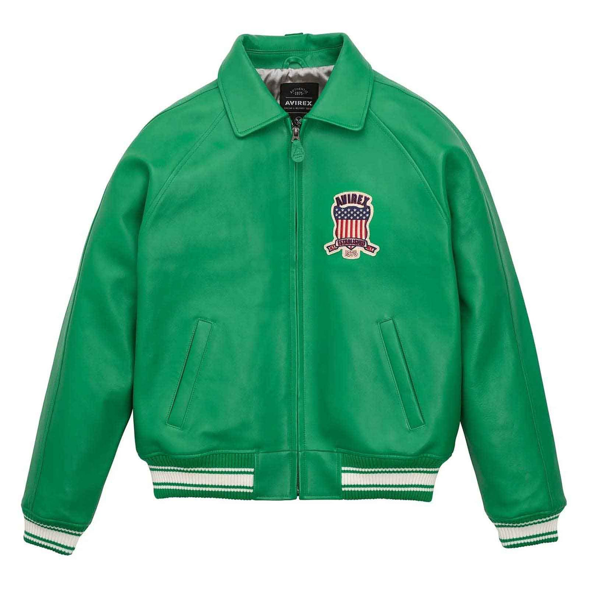 A green leather varsity-style jacket with a zip-up front, ribbed collar, cuffs, and hem, featuring a US flag crest patch on the left chest with the brand name 'MIRAE' and 'NEW YORK' embroidered on it. The jacket is displayed flat against a solid white background.