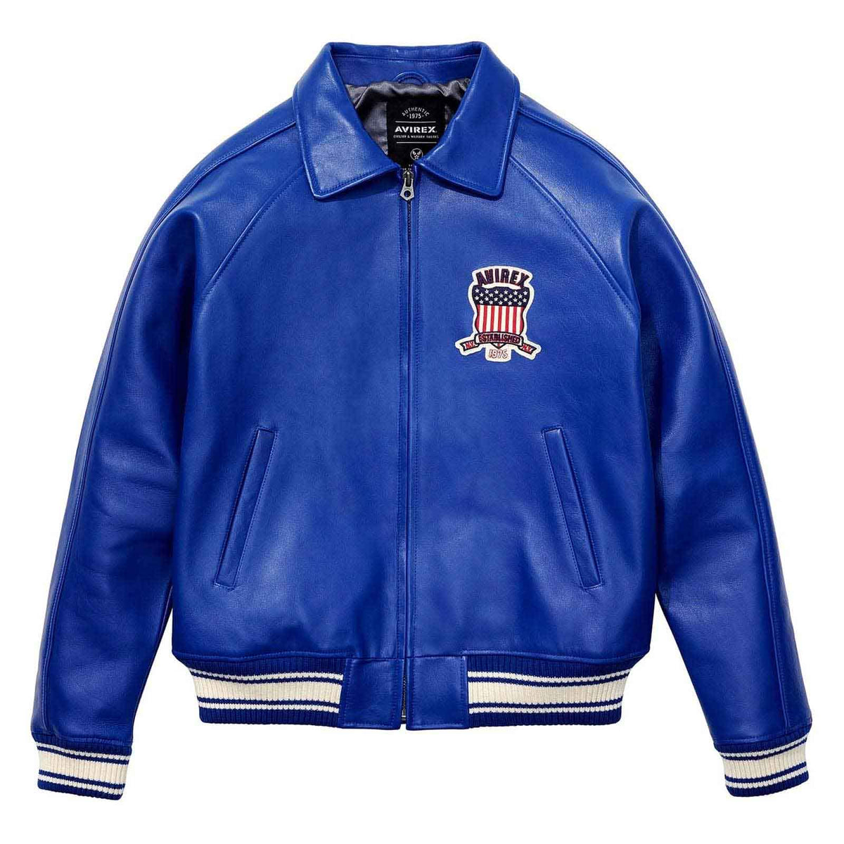 A royal blue leather varsity jacket with a front zipper, ribbed knit collar, cuffs, and hem, featuring a 'MIDEK' embroidered patch on the left chest. The jacket is displayed flat against a solid white background.