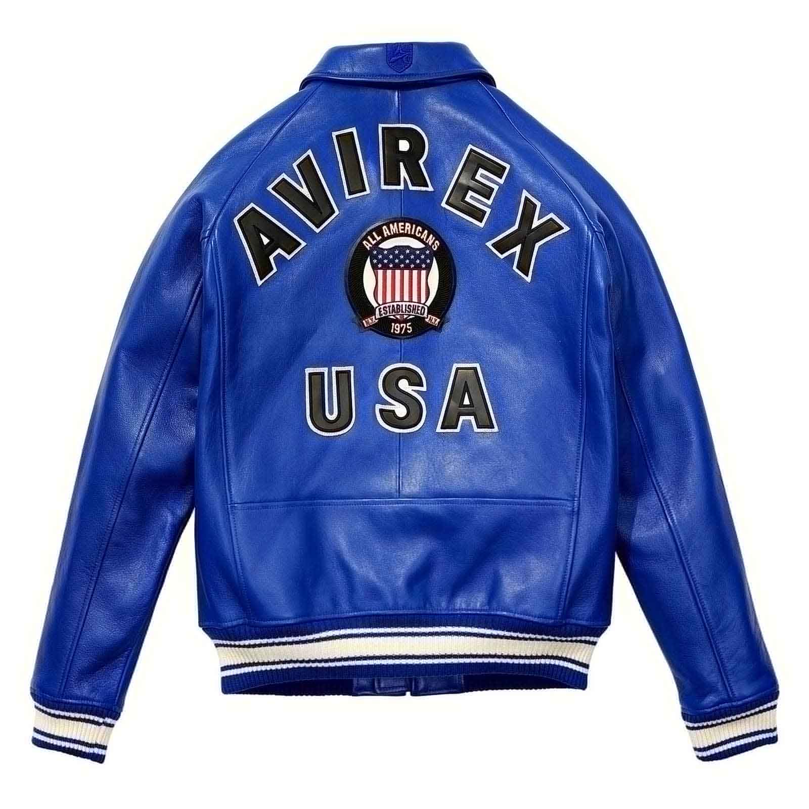The back of a royal blue leather varsity jacket featuring 'AVIREX USA' and an 'All American' circular patch on a white background.