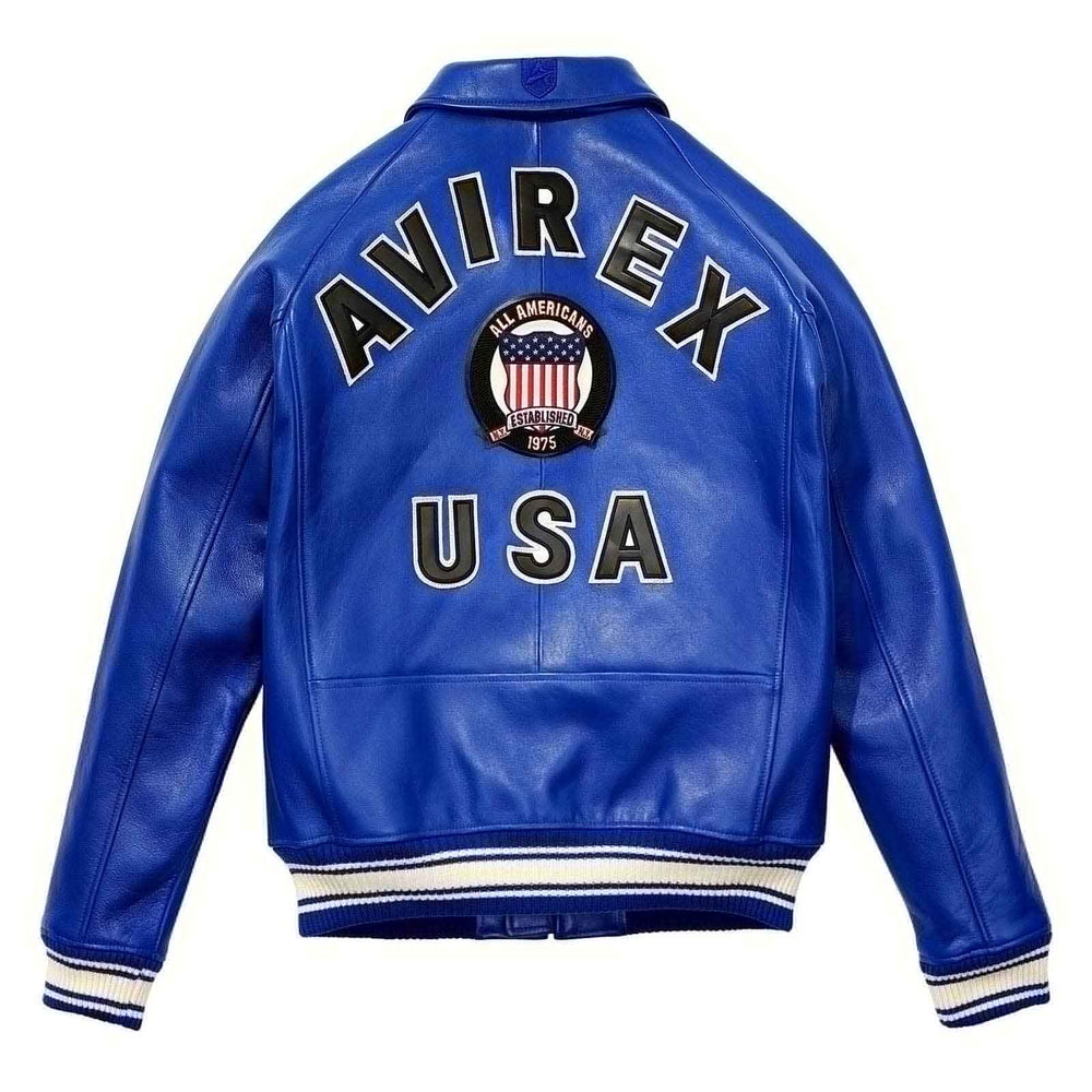 The back of a royal blue leather varsity jacket featuring 'AVIREX USA' and an 'All American' circular patch on a white background.