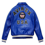 The back of a royal blue leather varsity jacket featuring 'AVIREX USA' and an 'All American' circular patch on a white background.