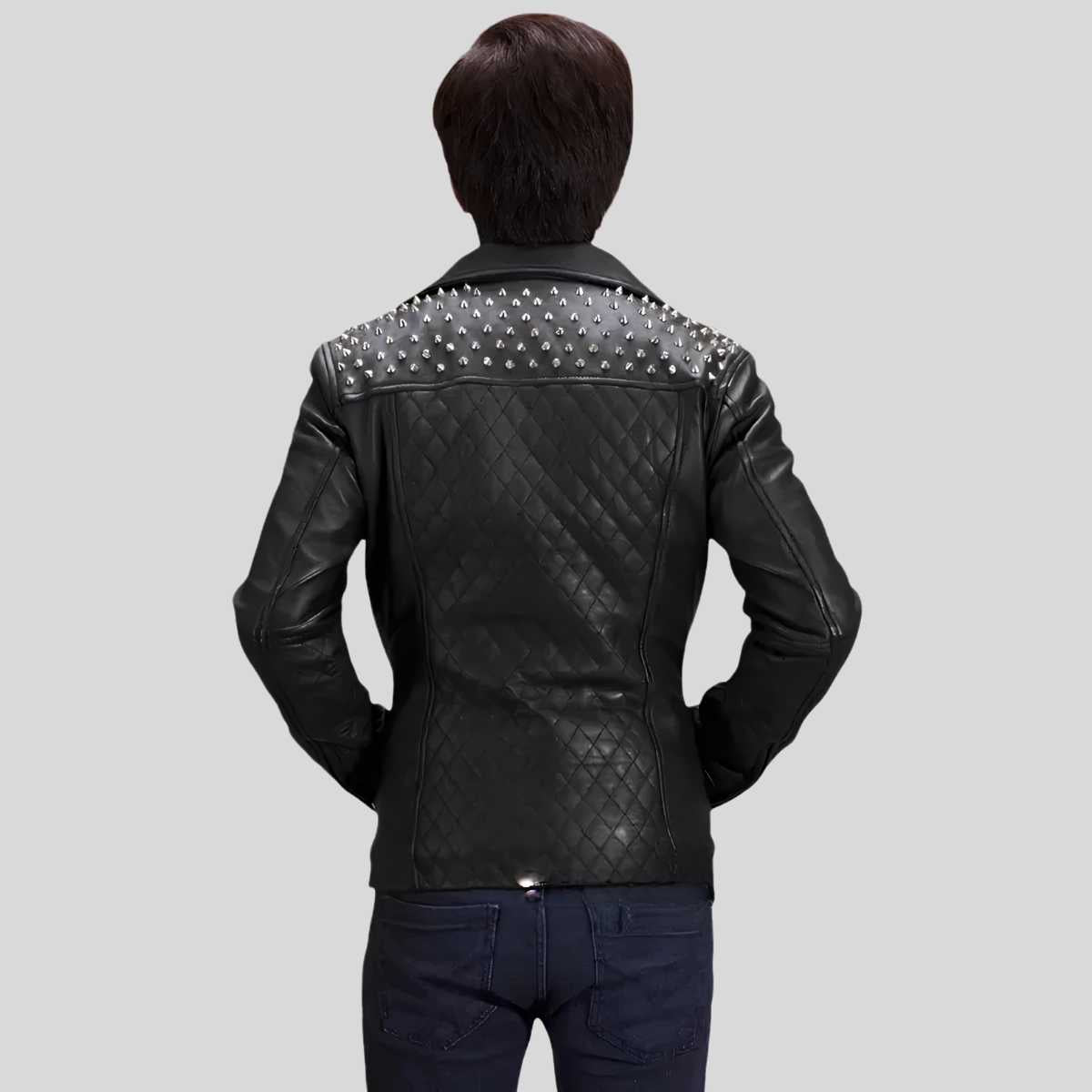 Side profile of studded motorcycle jacket showing asymmetrical zipper