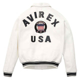 An off-white leather varsity jacket shown from the back, featuring 'AVIREX USA' and a circular 'U.S.