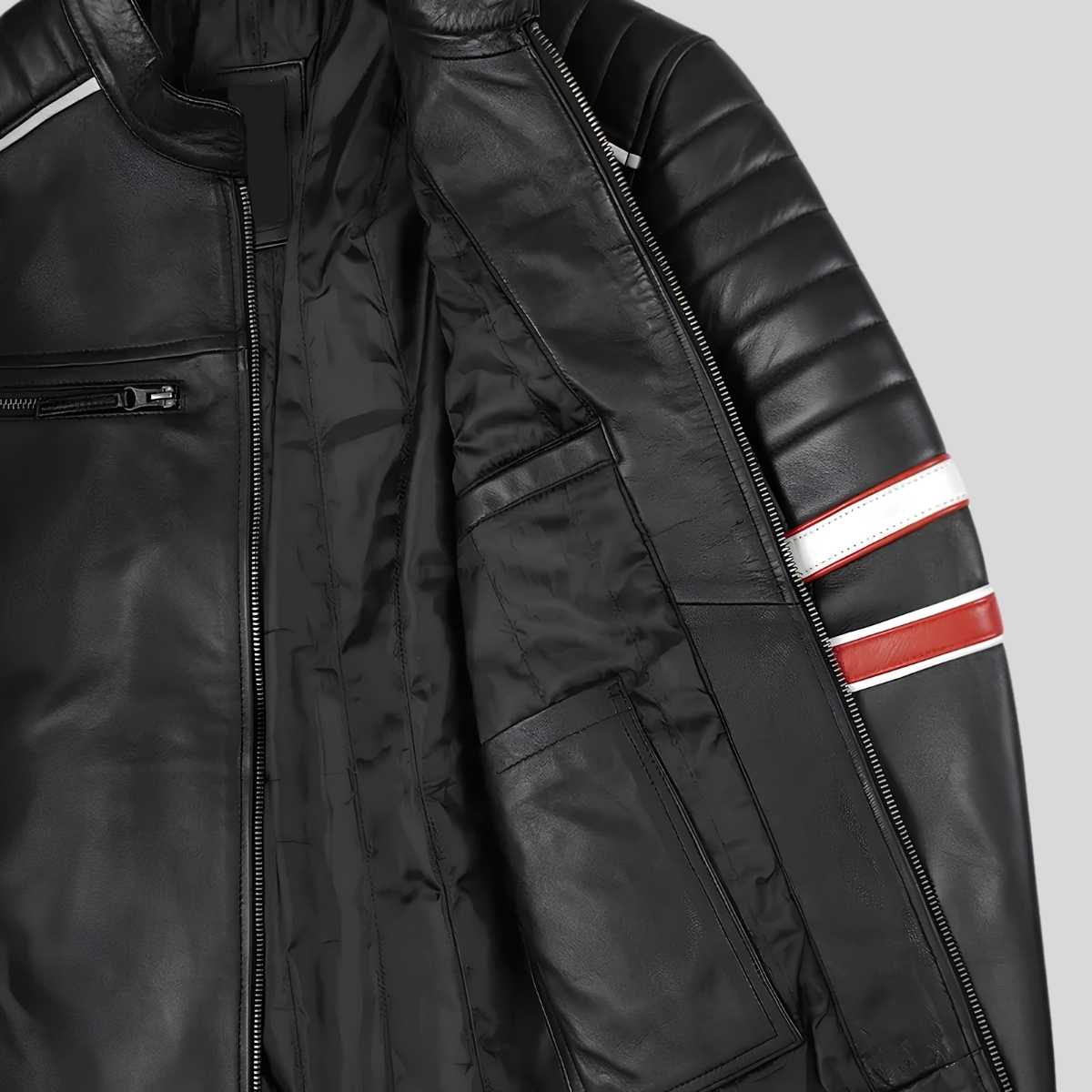 Close-up of red and white racing stripe on leather jacket sleeve