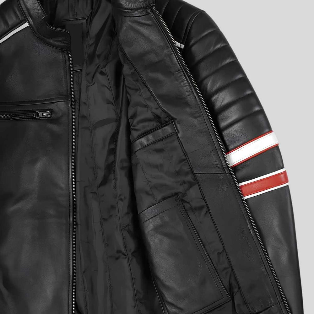 Close-up of red and white racing stripe on leather jacket sleeve
