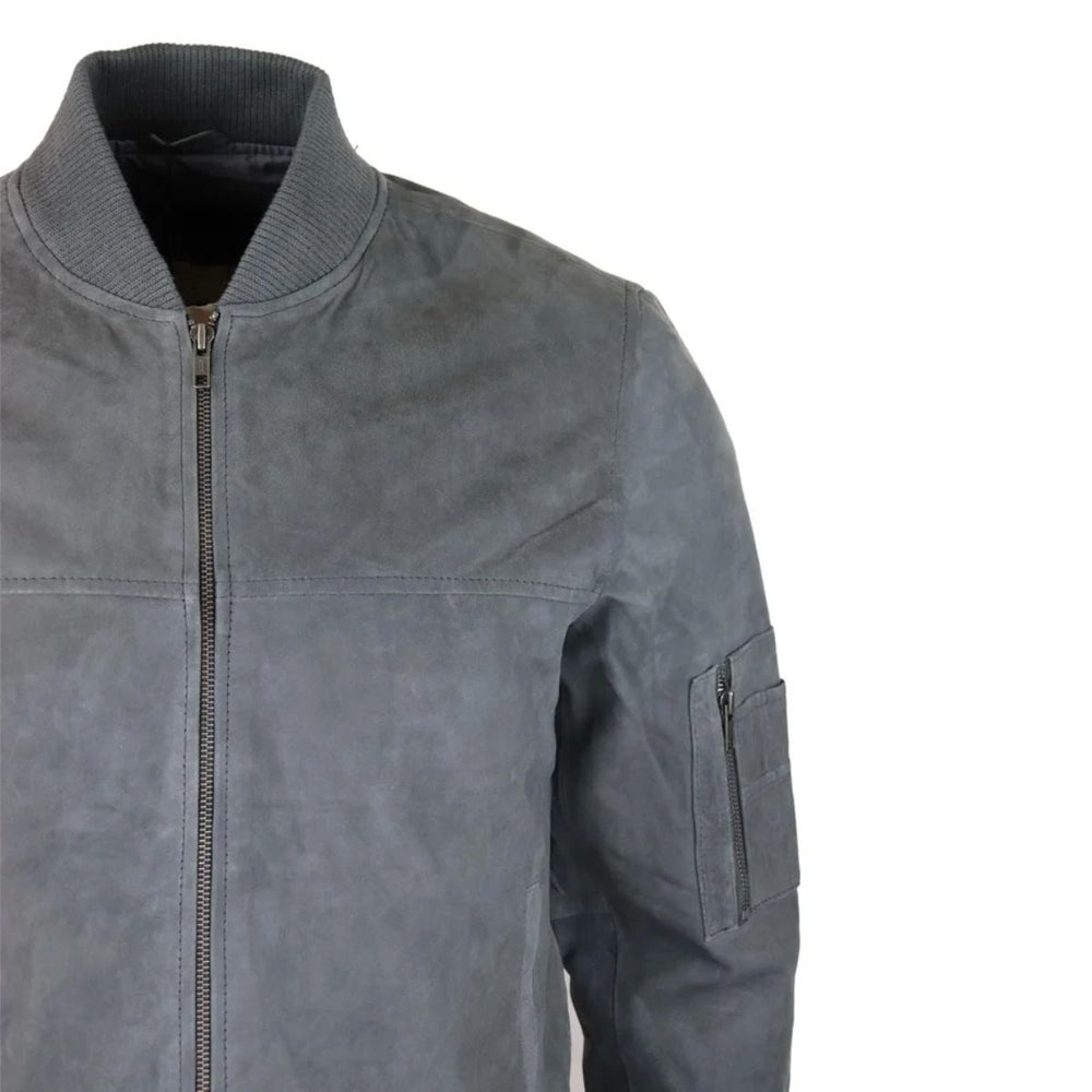 A gray suede or nubuck zip-up jacket with a ribbed mock neck collar and a zippered sleeve pocket, shown on a plain white background.