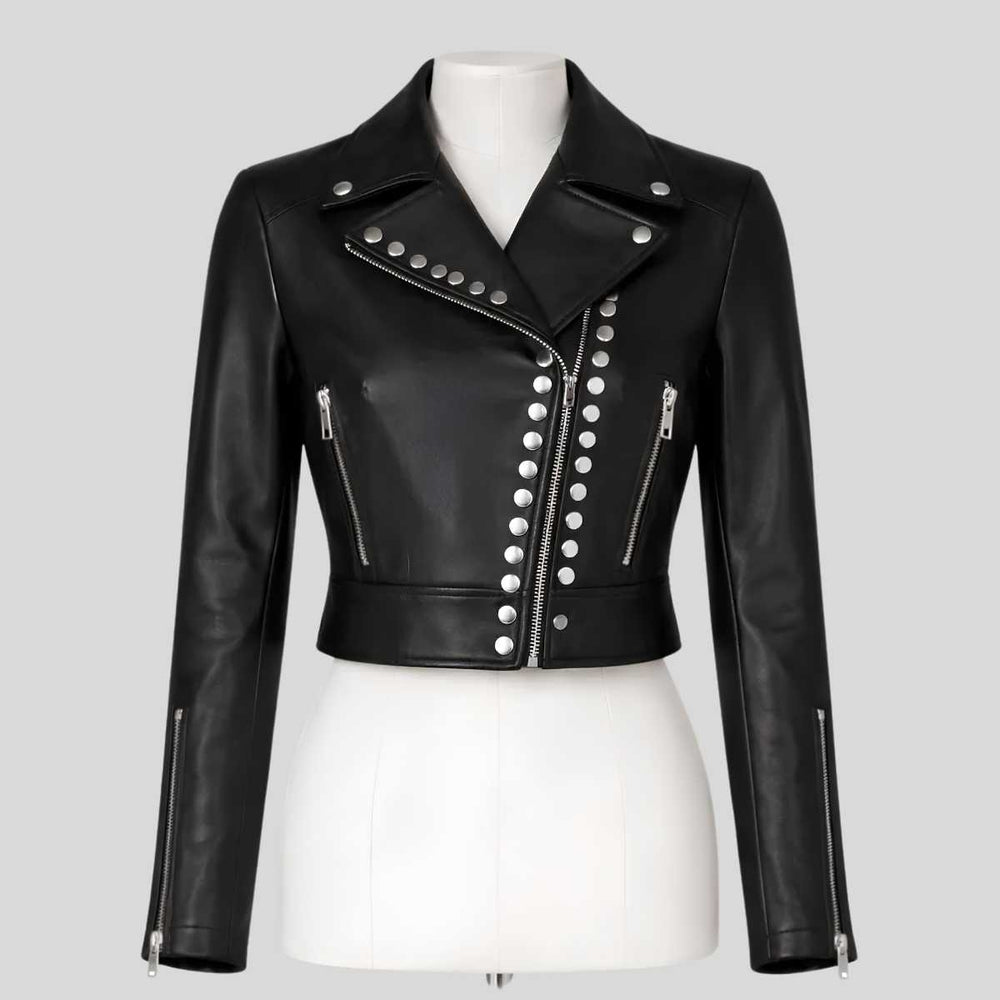 Close-up of silver studs on women's cropped leather jacket