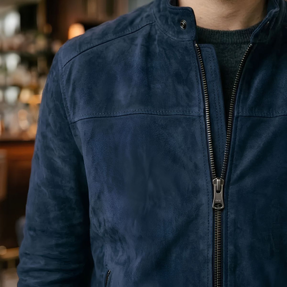 Close-up of snap collar on blue suede jacket