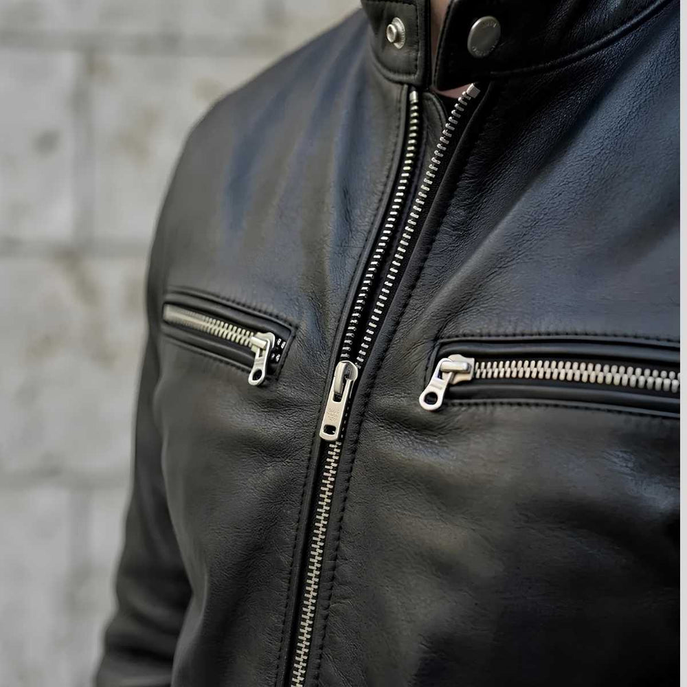 Close-up of zip chest pocket on cowhide cafe racer jacket
