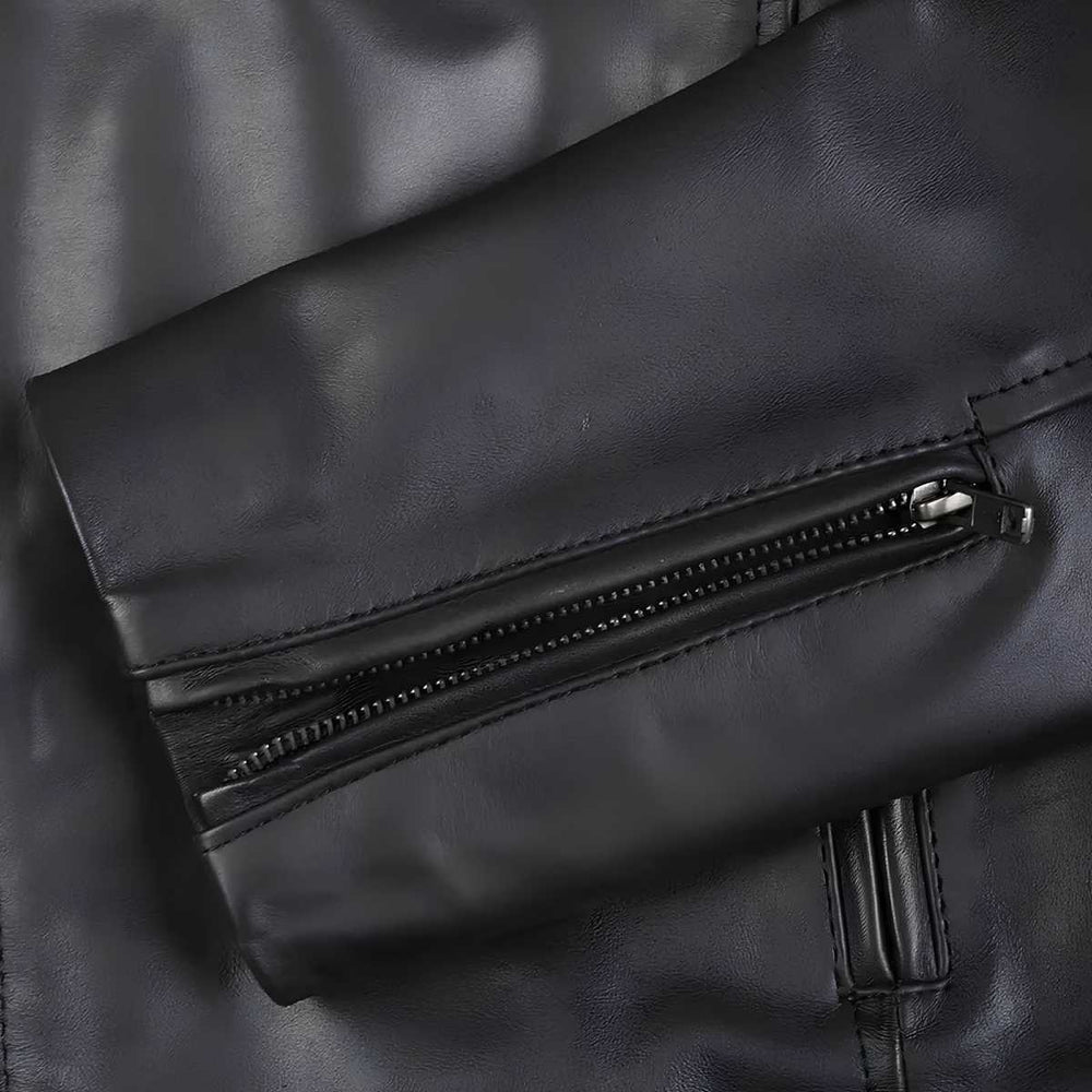 up: Close-up of zip chest pocket on black leather jacket