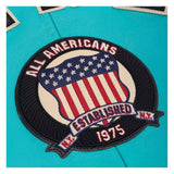 A circular embroidered patch featuring a shield with an American flag design, surrounded by the text 'ALL AMERICANS' and 'ESTABLISHED N.Y.