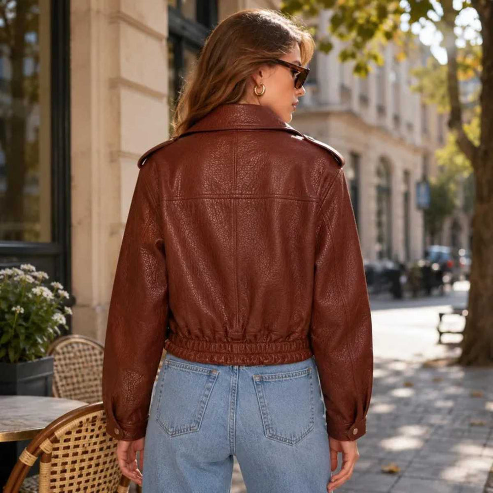 Back view of women's oversized leather bomber jacket