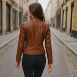 Back view of women's quilted shoulder leather jacket