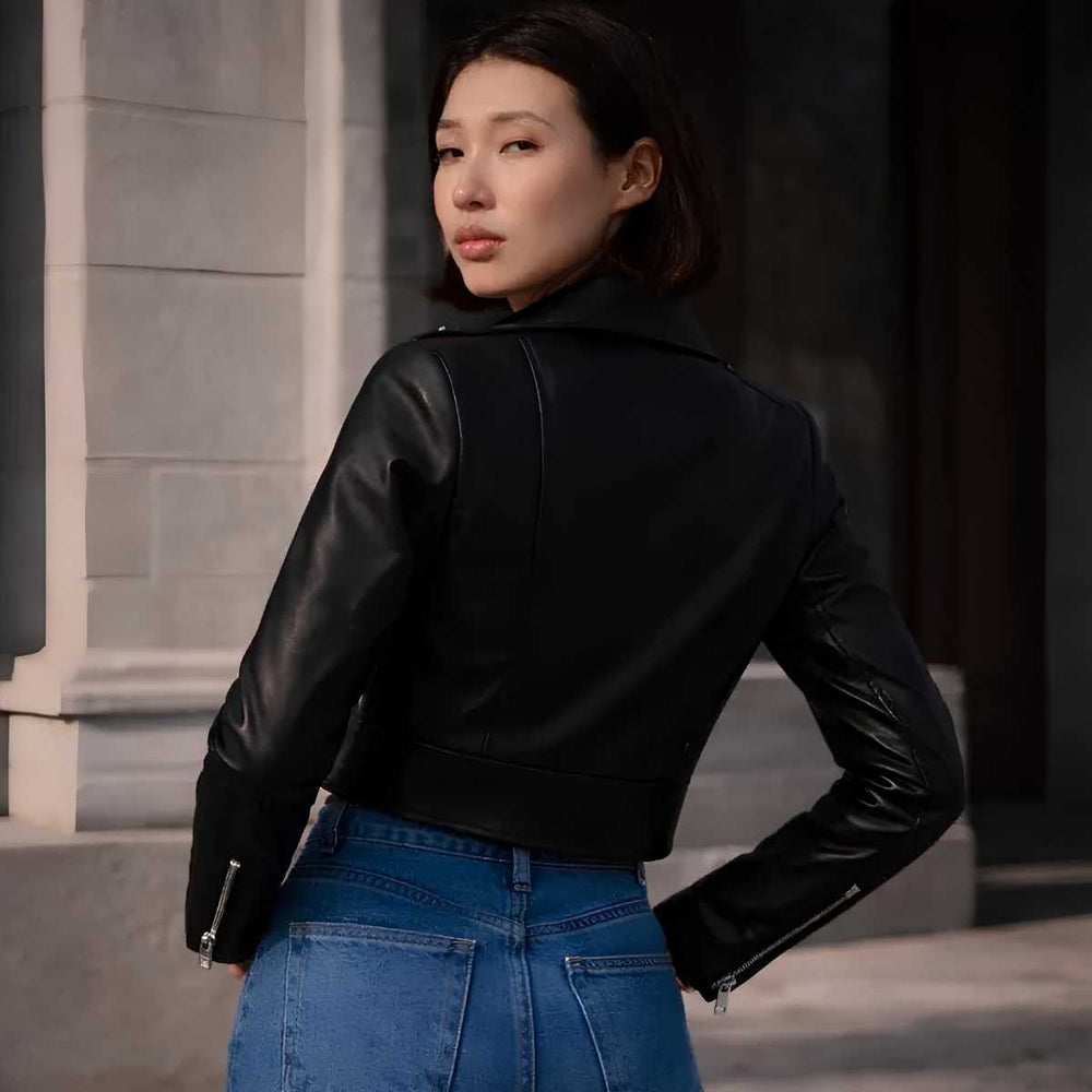 Back view of women's cropped leather biker jacket