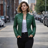 Woman wearing green leather cafe racer jacket with jeans