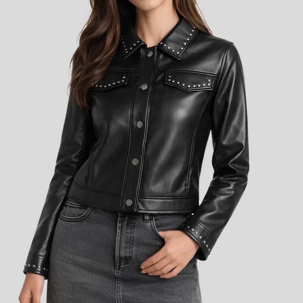 Women's black studded leather shirt jacket front view — golden stud collar and snap button closure